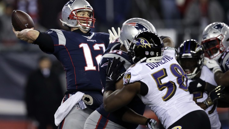 New England Patriots quarterback Tom Brady throws a pass against the Baltimore Ravens in Week 14